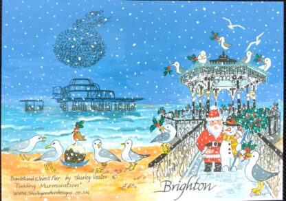 Father Christmas stands in front of the Bandstand with a snowman in the snow. Seagulls are perching on the roof. On the back is the skeletal remains of the West Pier with the starlings murmuration overhead and gulls with Christmas pud on the beach.