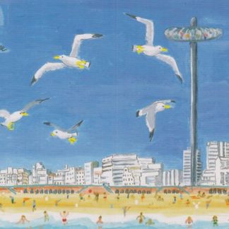 View from the sea of beach and gulls with i360