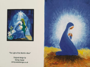 Kneeling Mary cradles the new-born baby Jesus. A bright halo of light surronds them against the deep blue of the night. The image on the back of the card is a nativity scene with Mary, Joseph and the baby Jesus lit by the light of the star.